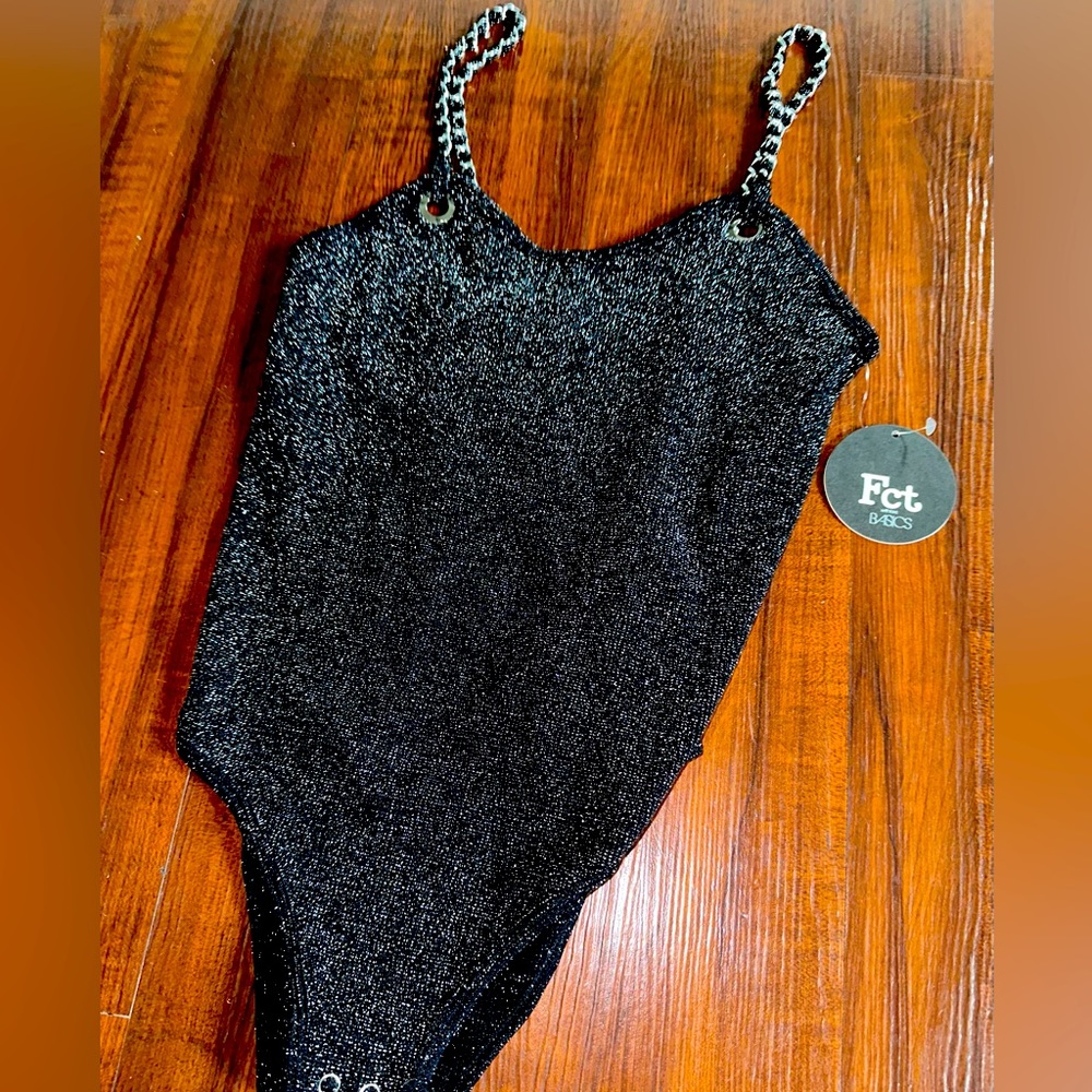 Sparkly black bodysuit, very elegant to wear on any occasion.